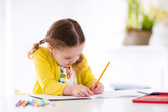 Students learning how to write